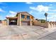 Exterior elevation of property with driveway and terracotta tile roof at 4360 Flandes St, Las Vegas, NV 89121