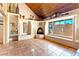 Stylish living room boasts a fireplace, window, and tiled floor, perfect for relaxation at 4360 Flandes St, Las Vegas, NV 89121