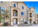 Modern exterior of a multi-story home with a private balcony at 4516 Townwall St, Las Vegas, NV 89115