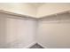 A clean walk-in closet offers practical storage and organization solutions at 4516 Townwall St, Las Vegas, NV 89115