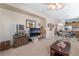 Open-concept floorplan with cozy living room and kitchen area at 4631 Forest Shadow Ave, Las Vegas, NV 89139