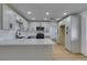 Bright kitchen with white cabinets, modern hardware, and stainless steel appliances at 4670 E Boston Ave, Las Vegas, NV 89104
