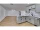 Renovated kitchen boasts stainless steel appliances, ample cabinetry, and modern finishes at 4670 E Boston Ave, Las Vegas, NV 89104