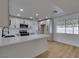 The updated kitchen features stainless steel appliances and a quartz countertop breakfast bar at 4670 E Boston Ave, Las Vegas, NV 89104