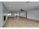 Open-concept living room with access to a kitchen and a patio at 4670 E Boston Ave, Las Vegas, NV 89104