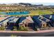 Beautiful home showcasing manicured landscaping and mountain views at 47 Reflection Bay Dr, Henderson, NV 89011