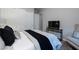 Modern bedroom with a plush bed and a view at 47 Reflection Bay Dr, Henderson, NV 89011