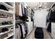Walk-in closet with ample shelving and drawers at 47 Reflection Bay Dr, Henderson, NV 89011