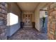 Inviting home entryway with stone accents and a 'hello' welcome mat at 47 Reflection Bay Dr, Henderson, NV 89011
