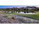 Breathtaking golf course views showcasing serene lake and mountain scenery for a peaceful setting at 47 Reflection Bay Dr, Henderson, NV 89011