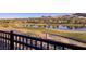 Community golf course with a lake surrounded by lush landscape and mountain views at 47 Reflection Bay Dr, Henderson, NV 89011