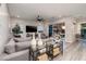 Comfortable living room with stylish decor, modern lighting, and a sliding glass door at 47 Reflection Bay Dr, Henderson, NV 89011