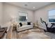 Inviting office space with comfortable sofa and plenty of light at 47 Reflection Bay Dr, Henderson, NV 89011
