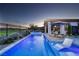Sparkling pool with water features, lounge chairs and spa for stylish outdoor living and relaxation at 47 Reflection Bay Dr, Henderson, NV 89011
