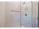 Modern shower featuring sleek tile and a built-in niche at 47 Reflection Bay Dr, Henderson, NV 89011