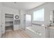 Bright bathroom featuring a glass enclosed shower and a soaking tub with decorative tiling and bright lighting at 4801 Westmont Dr, Pahrump, NV 89061