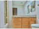 Bathroom with a single sink vanity and bath-shower combo at 5010 Longboat Cir, Las Vegas, NV 89113