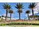 Community entrance showcases Spanish Trail signage and lush landscaping at 5010 Longboat Cir, Las Vegas, NV 89113