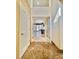 Inviting entryway featuring marble floors, decorative French doors, and a view into a living space at 5010 Longboat Cir, Las Vegas, NV 89113