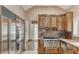 Gourmet kitchen with stainless steel appliances, custom cabinets, and granite countertops, perfect for culinary enthusiasts at 5010 Longboat Cir, Las Vegas, NV 89113