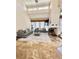 Bright and airy living room featuring a fireplace and large windows at 5010 Longboat Cir, Las Vegas, NV 89113
