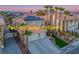 Beautiful two-story home featuring solar panels, a two-car garage, and professionally landscaped yard at 506 Staghorn Pass Ave, Las Vegas, NV 89183