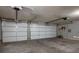 Spacious two car garage with overhead door openers and room for tools and yard maintenance equipment at 506 Staghorn Pass Ave, Las Vegas, NV 89183