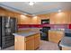Well-equipped kitchen features stainless steel appliances, granite countertops, and ample cabinet space at 506 Staghorn Pass Ave, Las Vegas, NV 89183