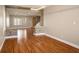 Bright living room featuring hardwood floors and stone accents at 506 Staghorn Pass Ave, Las Vegas, NV 89183