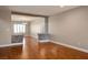 Open living space with hardwood floors, modern lighting, accent walls, and neutral color scheme at 506 Staghorn Pass Ave, Las Vegas, NV 89183