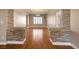 Spacious living room with hardwood floors and bright, natural light at 506 Staghorn Pass Ave, Las Vegas, NV 89183
