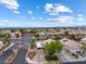 Aerial view of gated community, featuring well-maintained homes, landscaping, and RV parking at 5107 Morning Splash Ave, Las Vegas, NV 89131