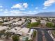 Community aerial view featuring landscape, surrounding houses and street layout of this planned development at 5107 Morning Splash Ave, Las Vegas, NV 89131