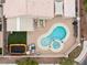 Aerial view of pool, trampoline and outdoor seating area in the back yard at 5107 Morning Splash Ave, Las Vegas, NV 89131