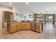 Open kitchen featuring granite countertops, stainless steel appliances, and views into the living area at 5107 Morning Splash Ave, Las Vegas, NV 89131