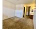 Bedroom featuring neutral walls, carpet and view to bathroom at 5245 Golden Ln, Las Vegas, NV 89119
