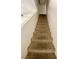 Carpeted stairs lead to the upper level of the home at 5245 Golden Ln, Las Vegas, NV 89119