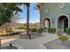 Exterior view of the community center near a pond, with a charming pathway and landscaping at 5327 Progresso St, Las Vegas, NV 89135