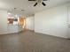 Spacious living room with tile floors that connects to the kitchen at 5327 Progresso St, Las Vegas, NV 89135