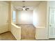 Cozy living room nook with a ceiling fan and a small window, carpeted floor at 5327 Progresso St, Las Vegas, NV 89135