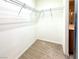 Walk-in closet with built in rack shelving and carpeted floor at 5327 Progresso St, Las Vegas, NV 89135