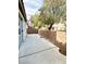 Backyard has a large concrete patio and a block wall perimeter at 5384 Hanging Tree Ln, Las Vegas, NV 89118