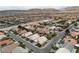 Expansive aerial view of a large residential neighborhood with desert mountains in the background at 5513 Oakview Falls Ct, Las Vegas, NV 89148