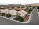 Aerial view of home highlighting desert-friendly landscaping and attached garage at 5513 Oakview Falls Ct, Las Vegas, NV 89148