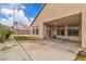 The backyard features a concrete patio, and partial landscaping at 5513 Oakview Falls Ct, Las Vegas, NV 89148