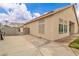 The backyard features a concrete patio, block wall, and partial landscaping at 5513 Oakview Falls Ct, Las Vegas, NV 89148