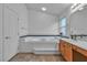 Bright bathroom featuring a built-in tub, and tile flooring at 5513 Oakview Falls Ct, Las Vegas, NV 89148