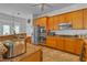 Kitchen featuring stainless steel appliances, a gas cooktop, and granite countertops at 5513 Oakview Falls Ct, Las Vegas, NV 89148