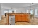 Kitchen featuring granite countertops, modern appliances, and tile flooring at 5513 Oakview Falls Ct, Las Vegas, NV 89148