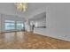 Open-concept living room with tile flooring, high ceilings, and natural light at 5513 Oakview Falls Ct, Las Vegas, NV 89148